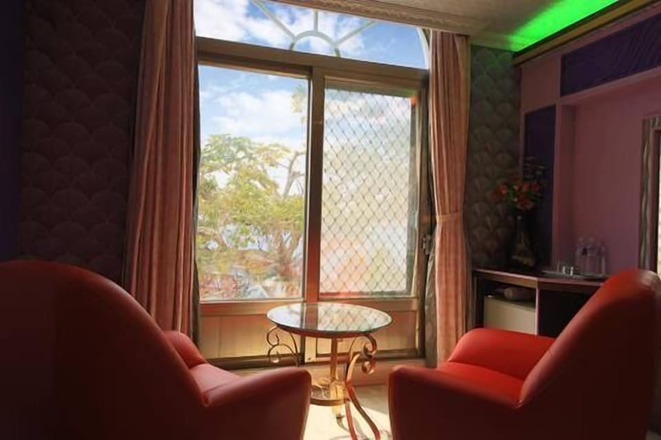 Romantic Double Room, Beach View | Living area | LCD TV