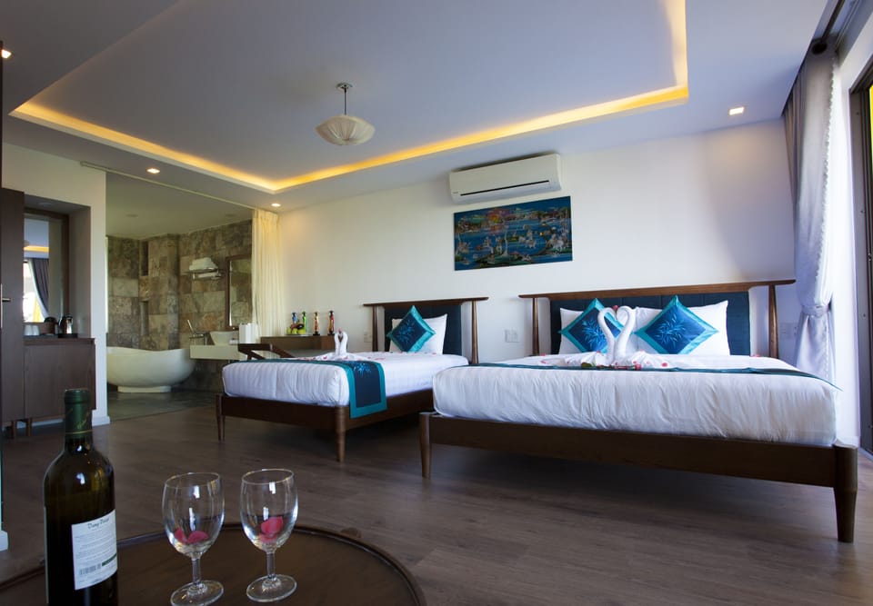 Junior Triple Room | Premium bedding, free minibar items, in-room safe, desk