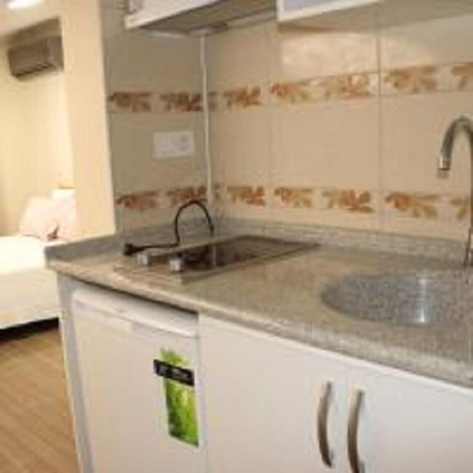 Deluxe Triple Room, Multiple Beds, Sea View | Private kitchen | Fridge, stovetop, electric kettle, cookware/dishes/utensils