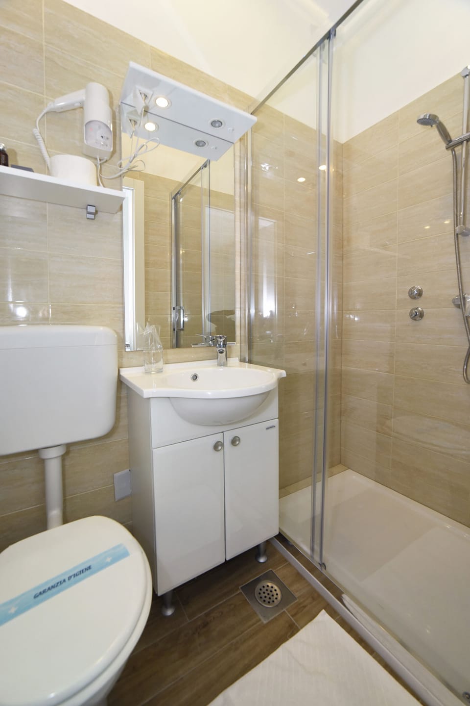 Shower, free toiletries, hair dryer, towels