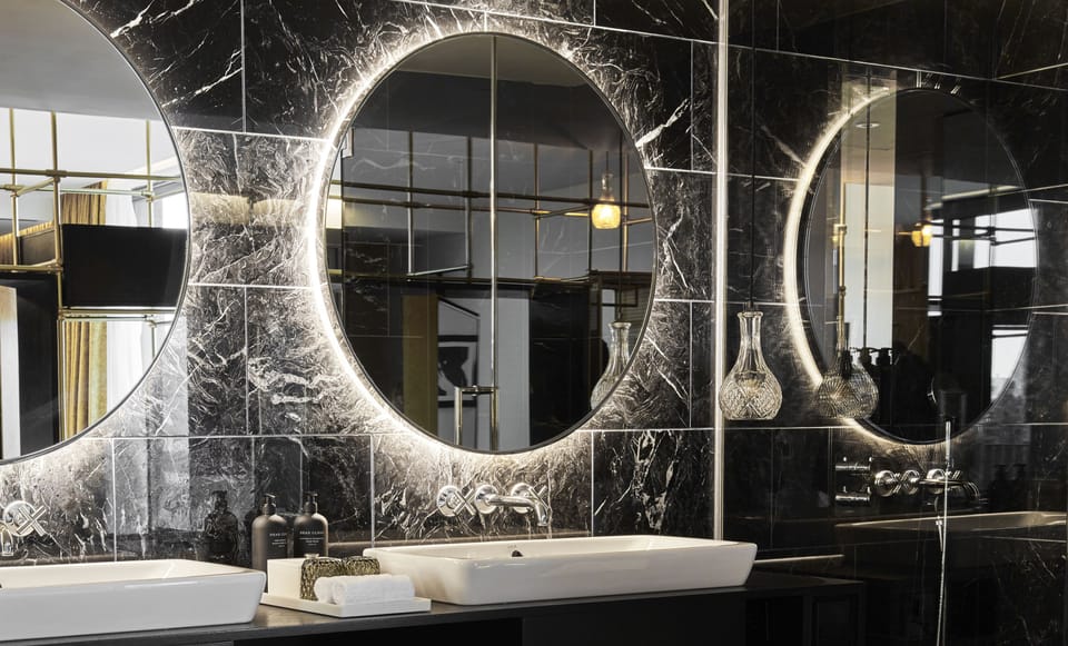 Separate tub and shower, rainfall showerhead, free toiletries