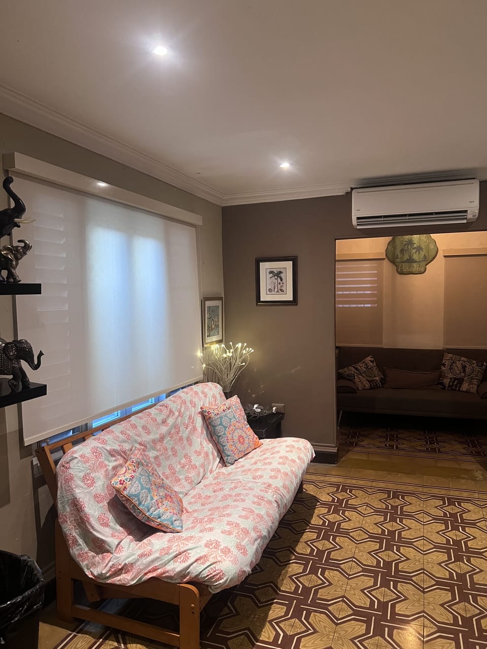 Family Room with full size futon with 40” smart TV