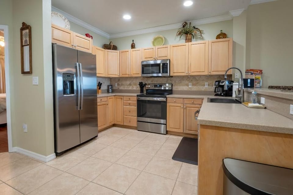KITCHEN OFF DINING AREA..