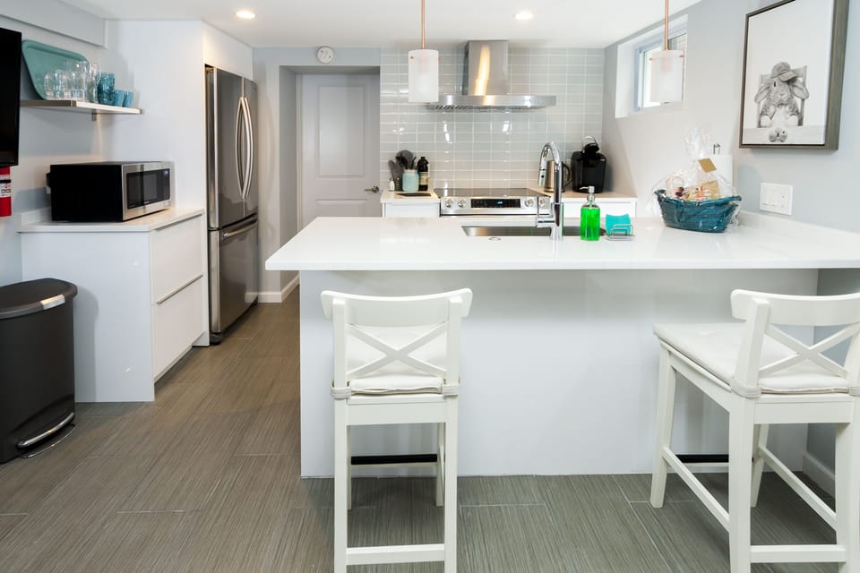 Another view of the kitchen with an island