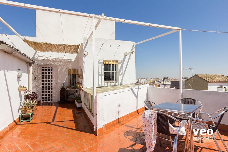 View of the apartment exterior with the shared outdoor area.