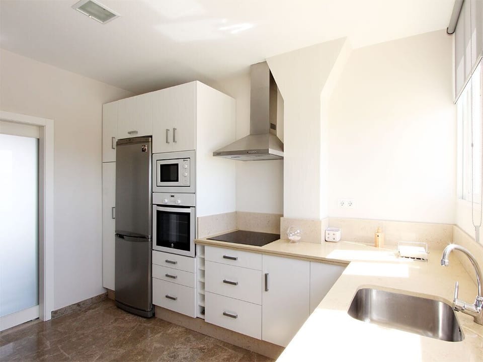 La cocina está perfectamente equipada - veoapartment
