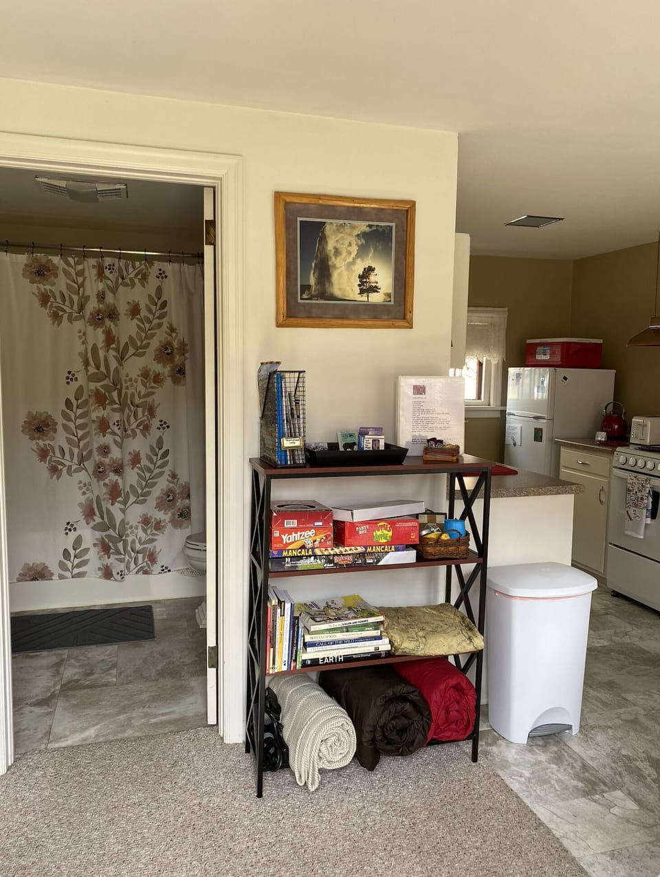 Entry to cottage. Bathroom and kitchen in view.