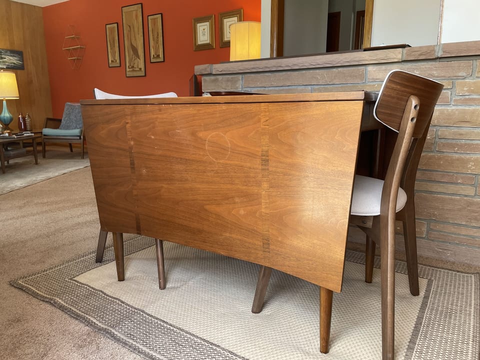 Dining table set for two. It expands and more chairs are available.