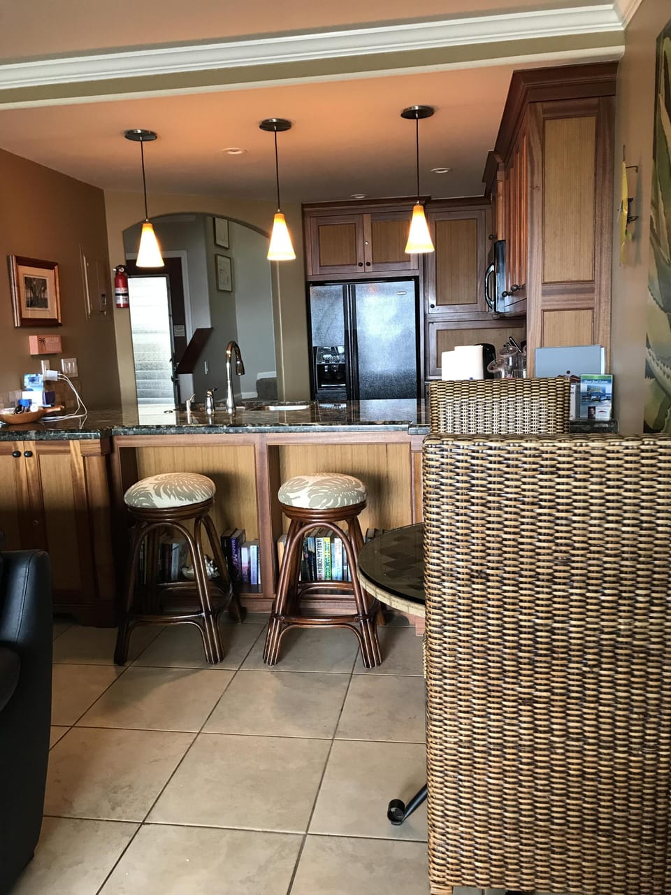 View into eating nook/bar and kitchen