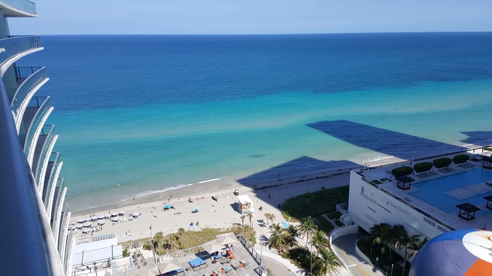 outdoor,  summer, beach ocean view, beach, aerial view, daytime, sun loungers, person