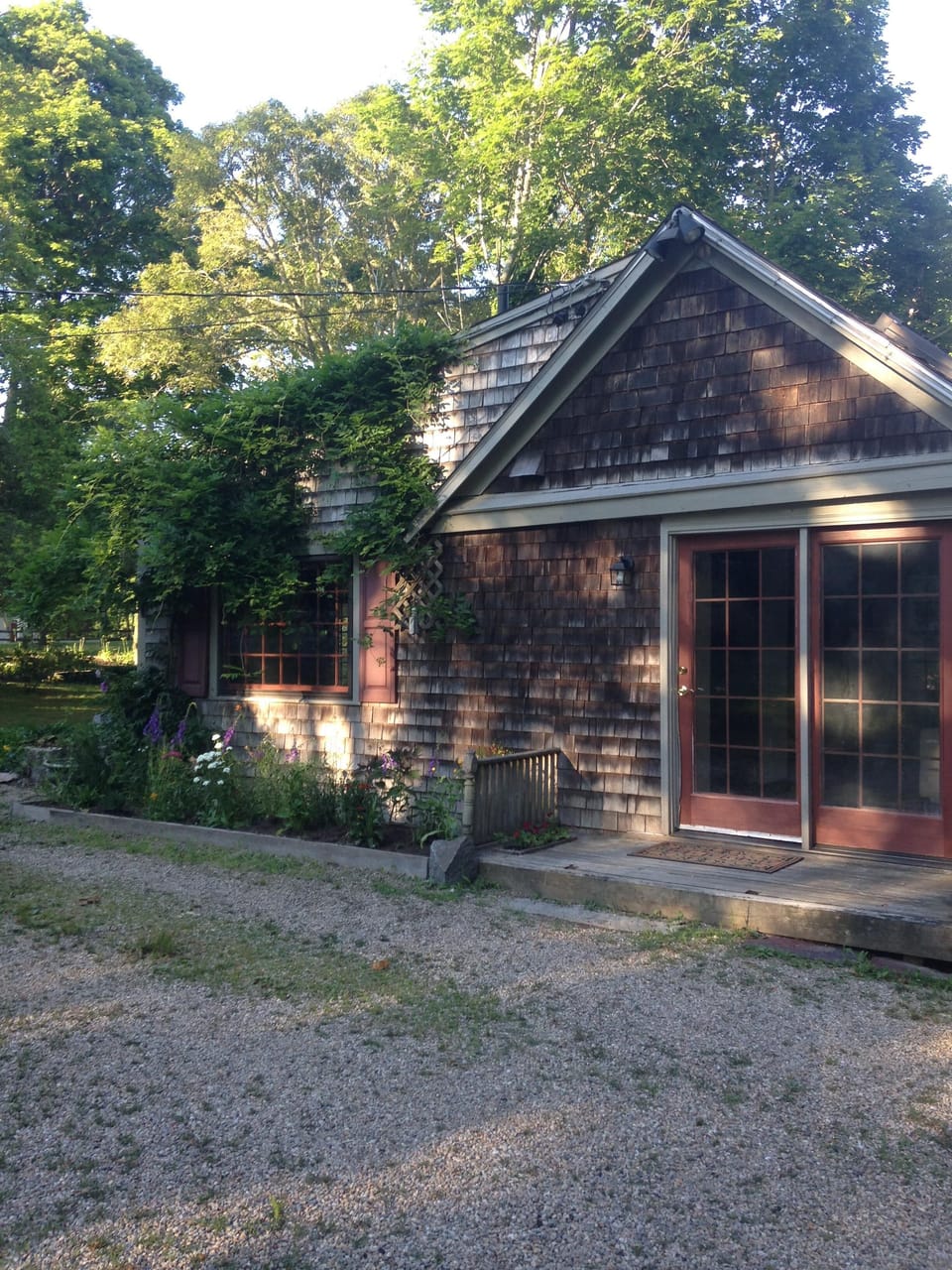 Cottage has a living room, queen bedroom, kitchen and bathroom with a shower.