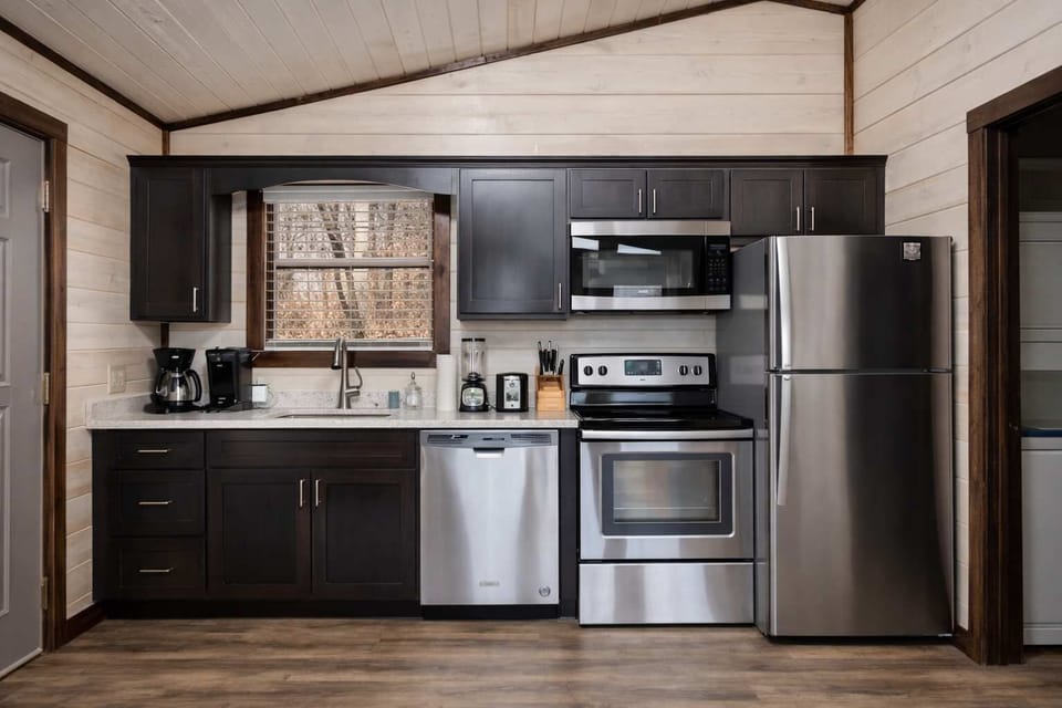 Kitchen Complete With Quartz Countertops And Stainless Steel Appliances!