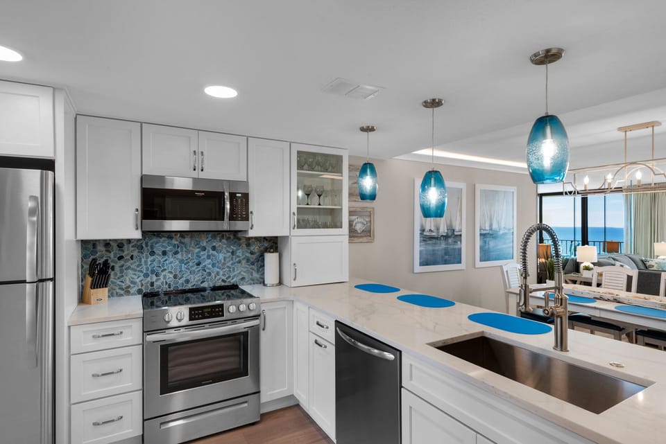 Kitchen stocked with necessities and brand new stainless steel appliances