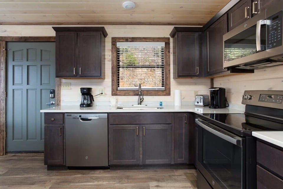 Kitchen Complete With Stainless Steel Appliances And Quartz Countertops!