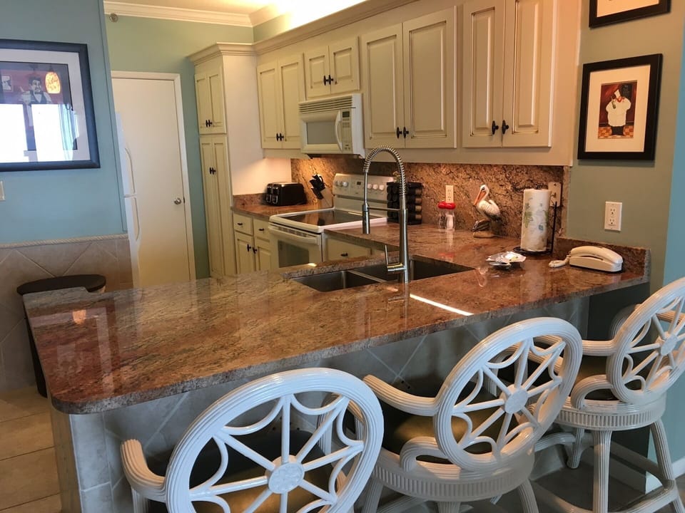 REMODELED KITCHEN WITH NEW GRANITE COUNTERS