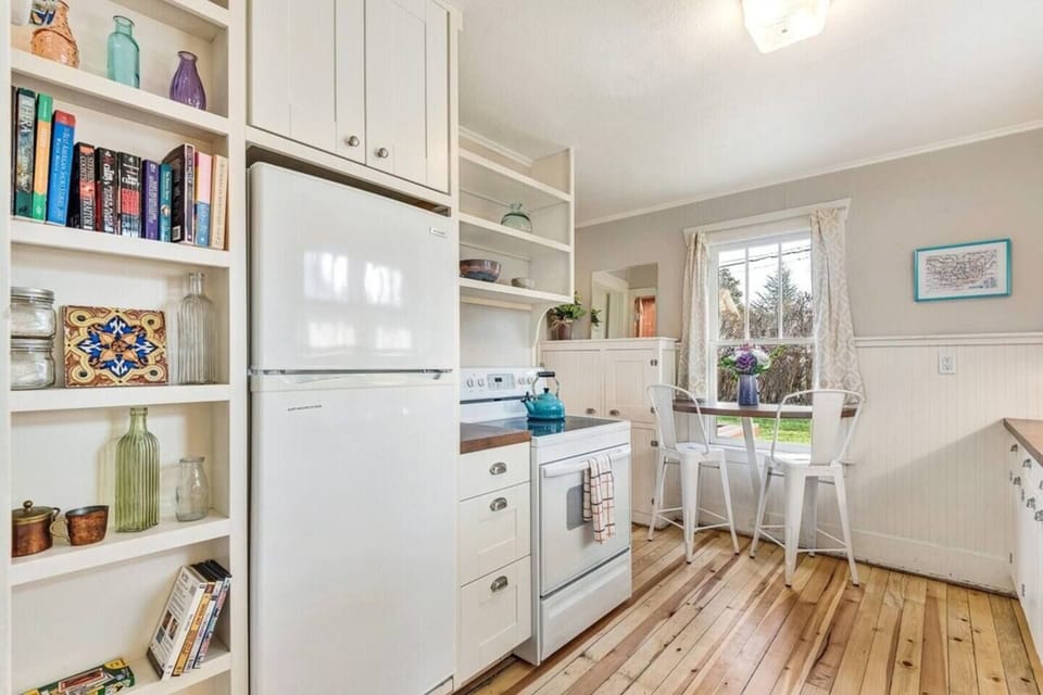 Kitchen with small cocktail sized table