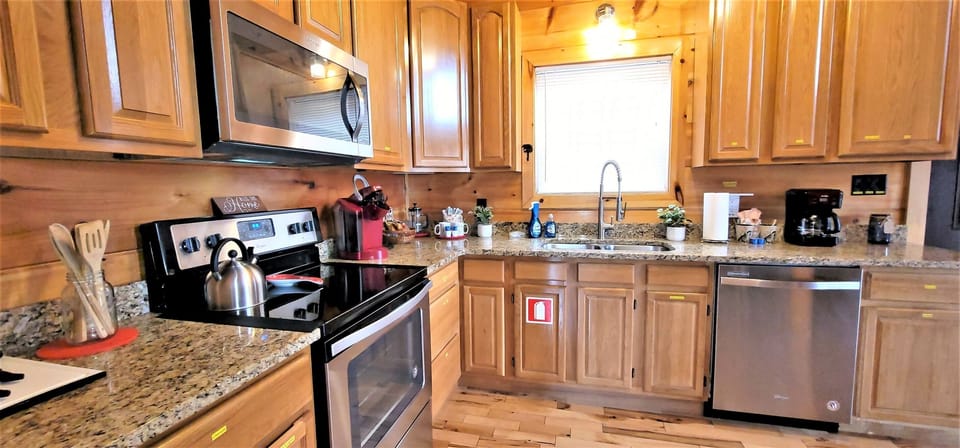 Glass top stove; microwave; cooking sets provided