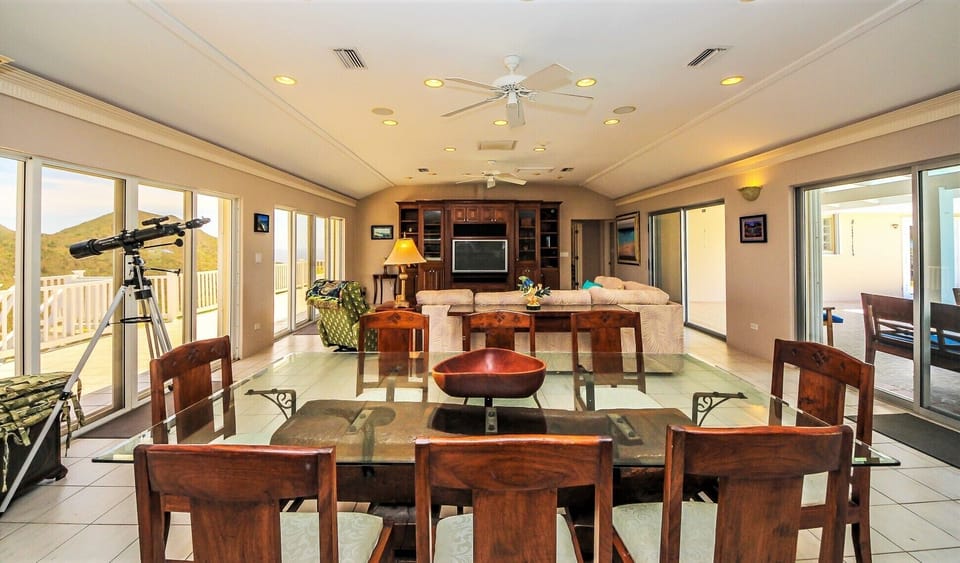 Great Room provides easy access to the pool and decks