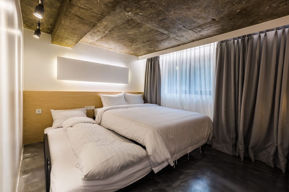 Basic Triple Room, Multiple Beds (Foreigner Only) | Blackout drapes, free WiFi, bed sheets