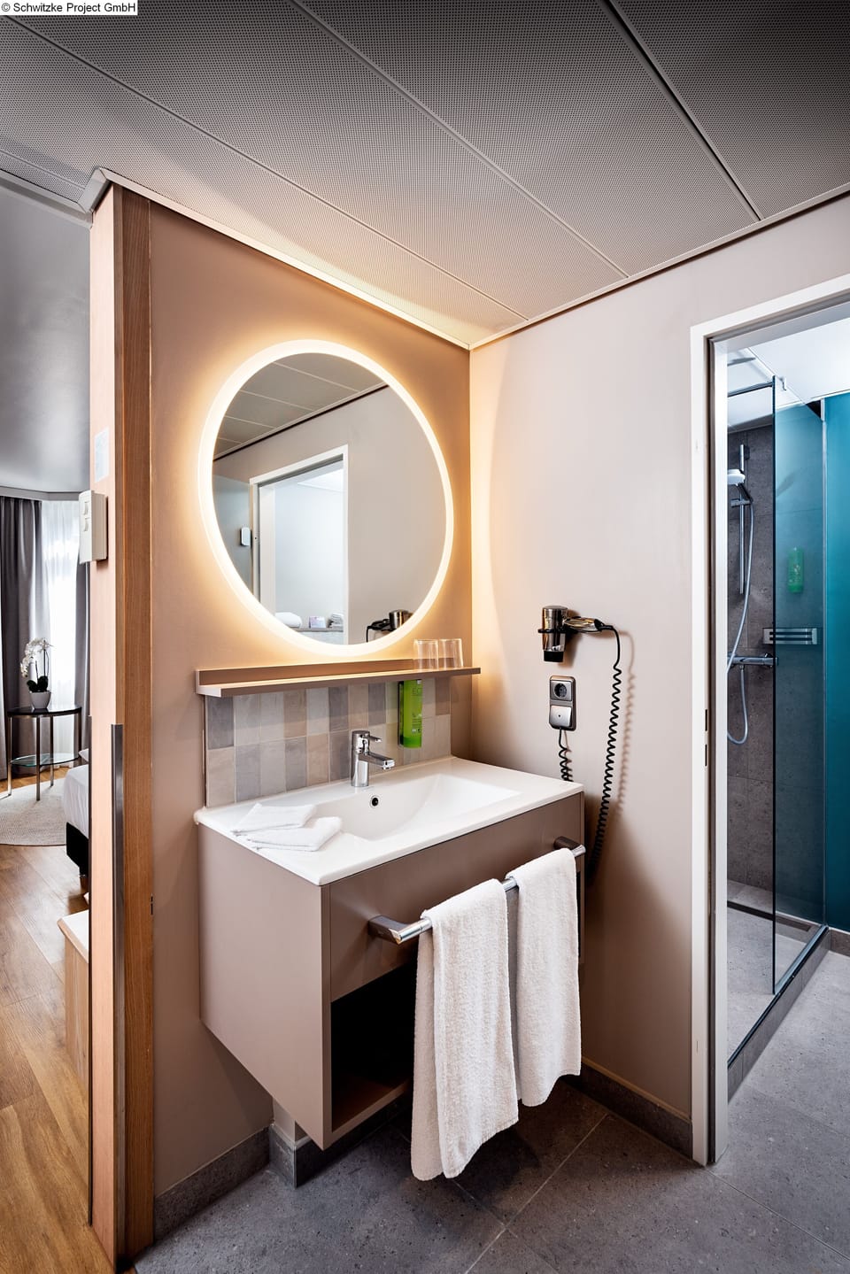Eco-friendly toiletries, hair dryer, towels, soap