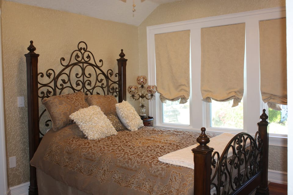 The Verona Room | Individually decorated, laptop workspace, blackout drapes, soundproofing