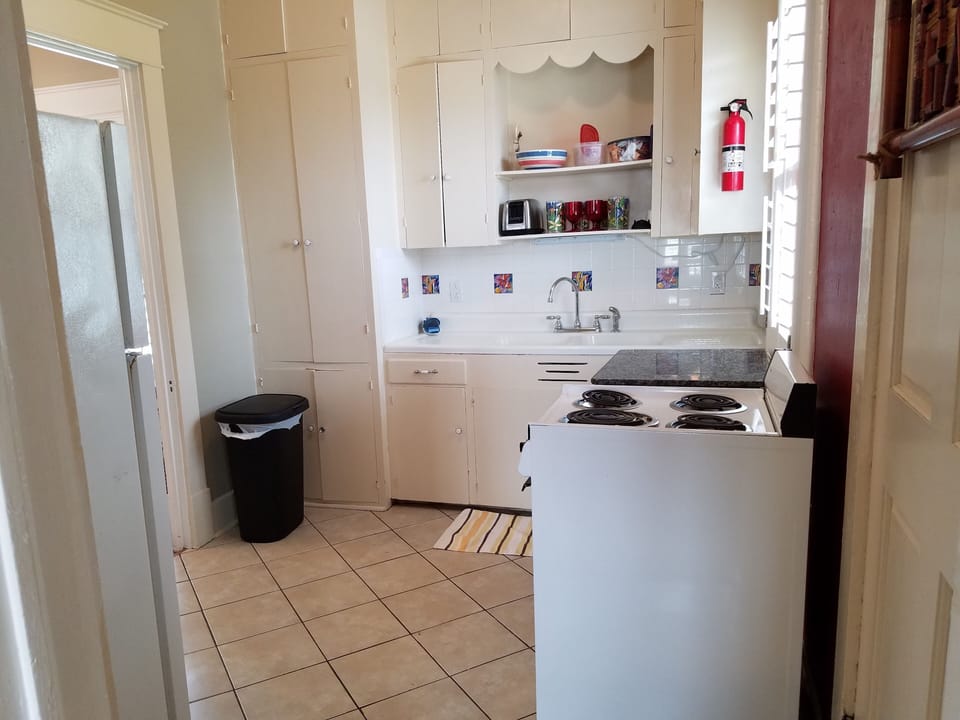 Kitchen is fully furnished. Full size fridge, and elec stove and oven.