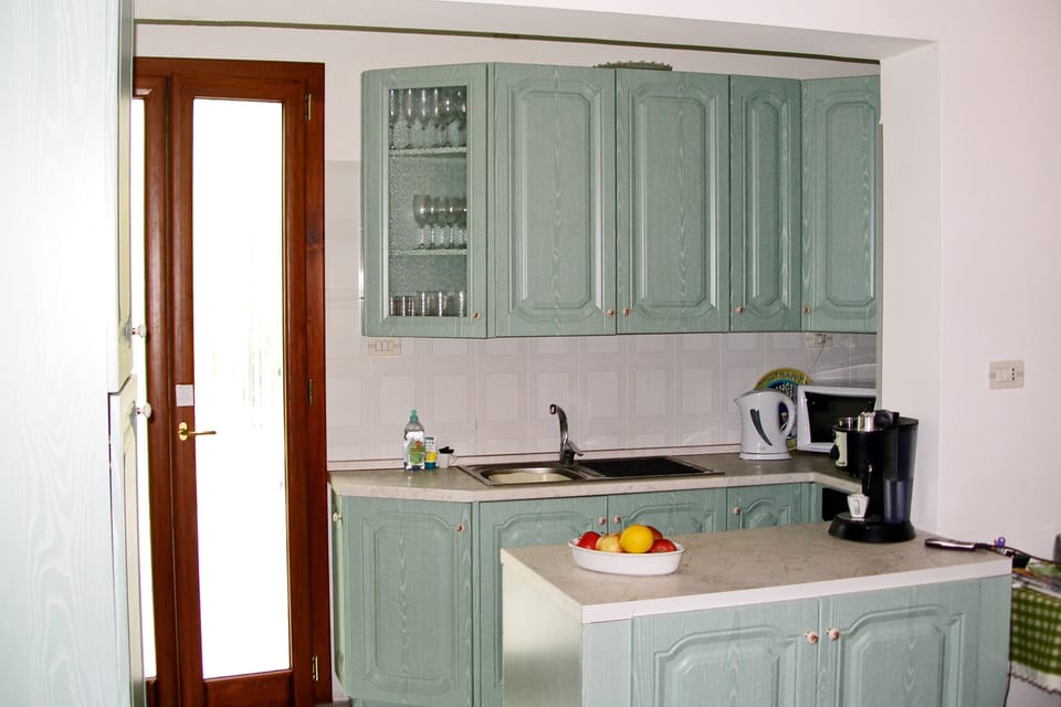 Part of Kitchen seen from lounge