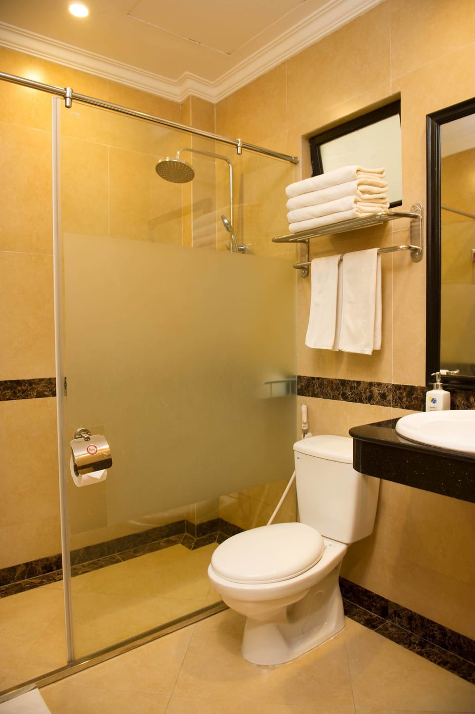 Shower, free toiletries, hair dryer, slippers