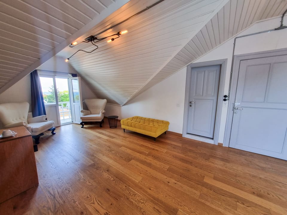 Suite, Balcony, Sea View | Minibar, iron/ironing board, free WiFi, bed sheets