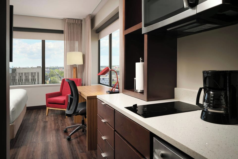 Studio, 1 King Bed | Private kitchen | Full-size fridge, microwave, stovetop, dishwasher
