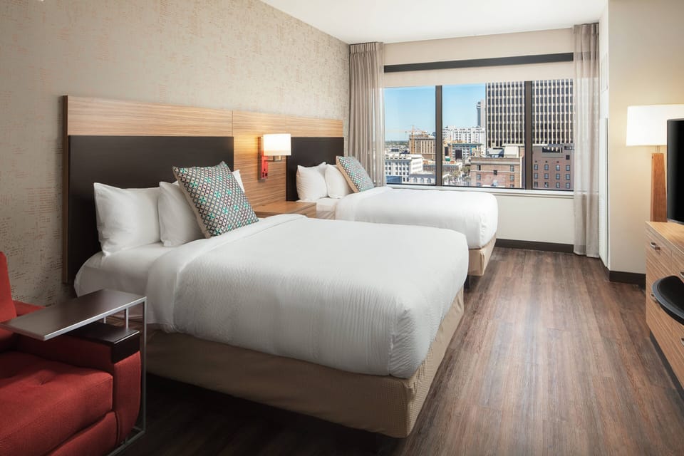 Premium bedding, pillowtop beds, desk, laptop workspace