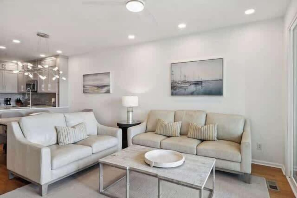 Newly renovated & updated! Living, dining & kitchen all open to each other with beach views.
