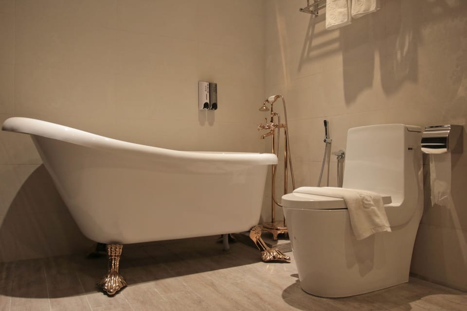 Supreme Room | Bathroom | Shower, free toiletries, hair dryer, slippers
