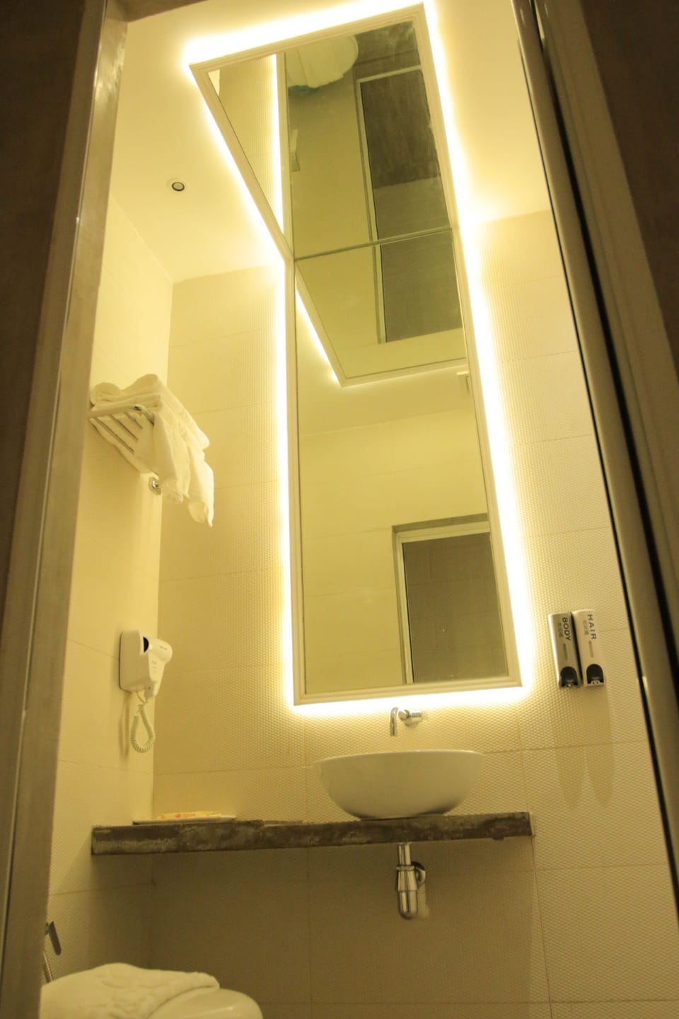 Shower, free toiletries, hair dryer, slippers