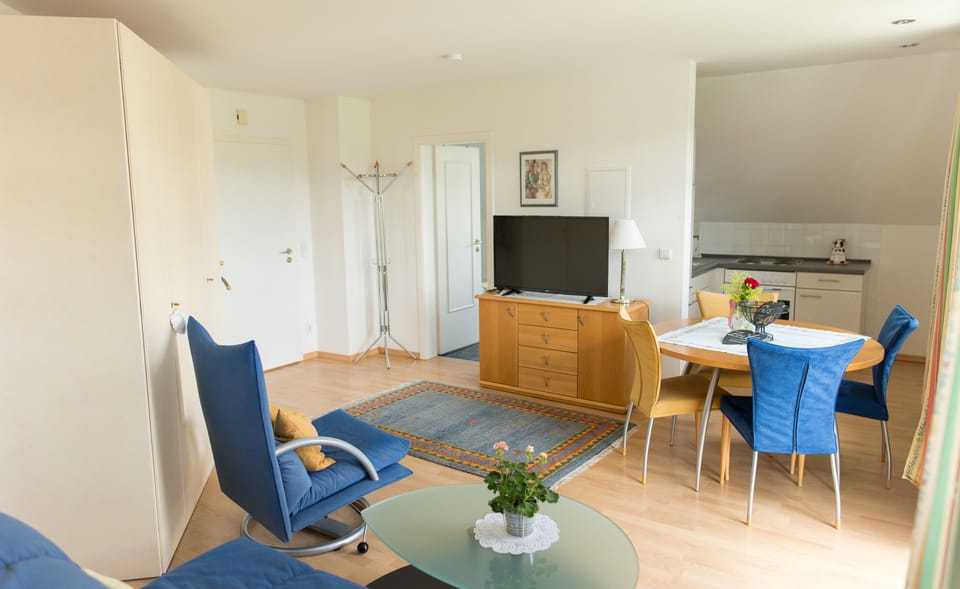 Apartment (1-2 adults) | Living area | 42-inch flat-screen TV with satellite channels, TV