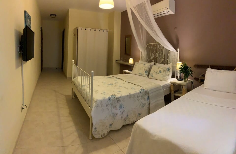 Standard Triple Room | Minibar, desk, blackout drapes, WiFi (free)