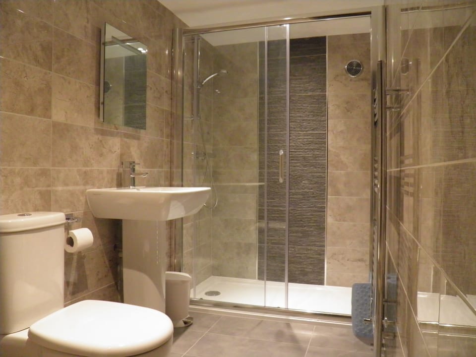 Shower, free toiletries, hair dryer, towels