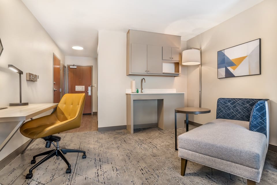 Suite, 1 King Bed with Sofa bed, Accessible (Mobility, Accessible Tub) | Desk, laptop workspace, blackout drapes, iron/ironing board
