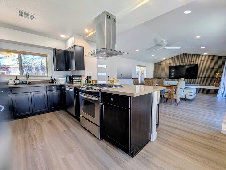 Kitchen with view to open living / dining area.