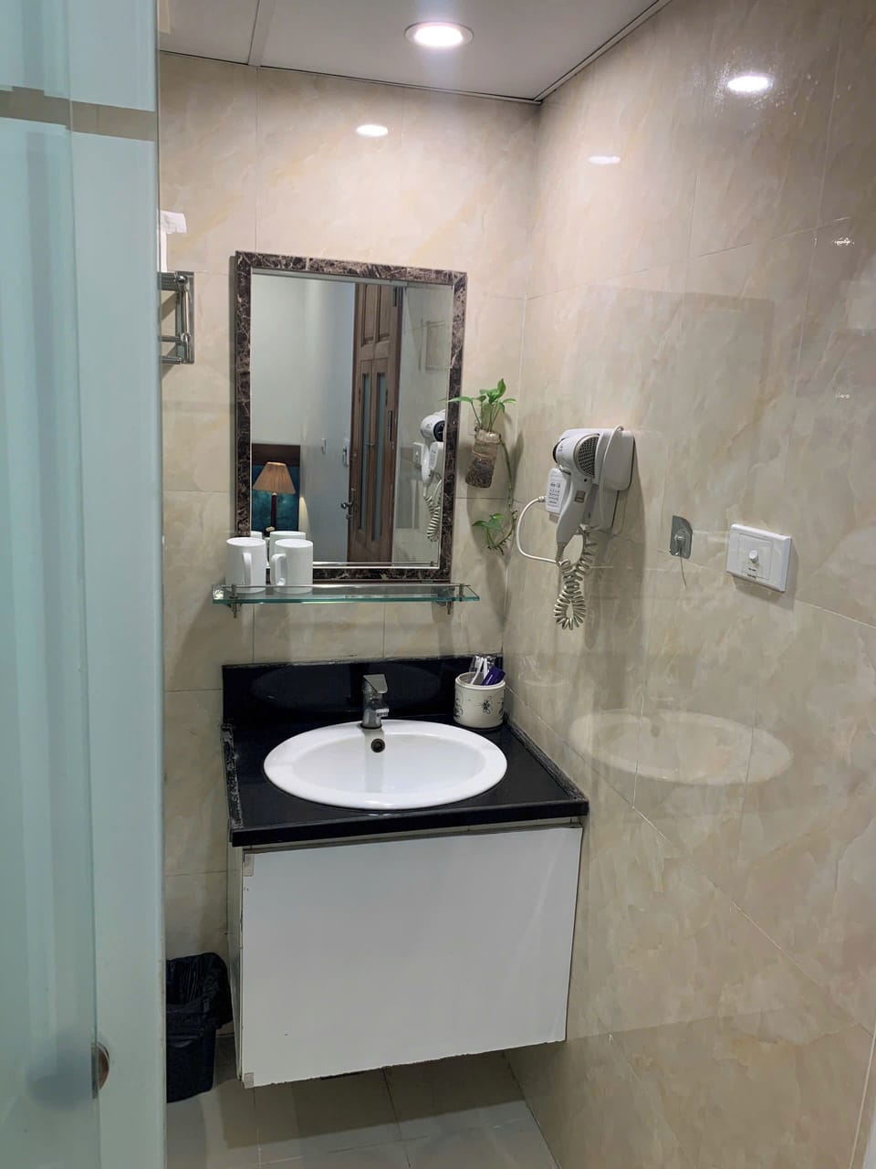 Shower, free toiletries, hair dryer, slippers