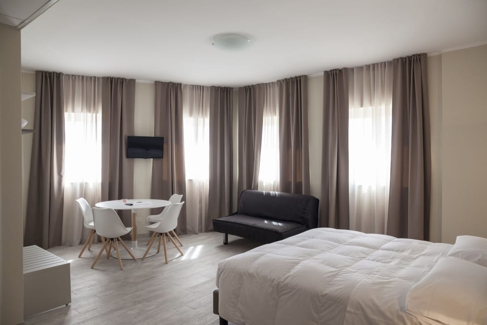 Junior Studio Suite, 1 Double Bed with Sofa bed, Kitchenette | Down comforters, memory foam beds, desk, blackout drapes