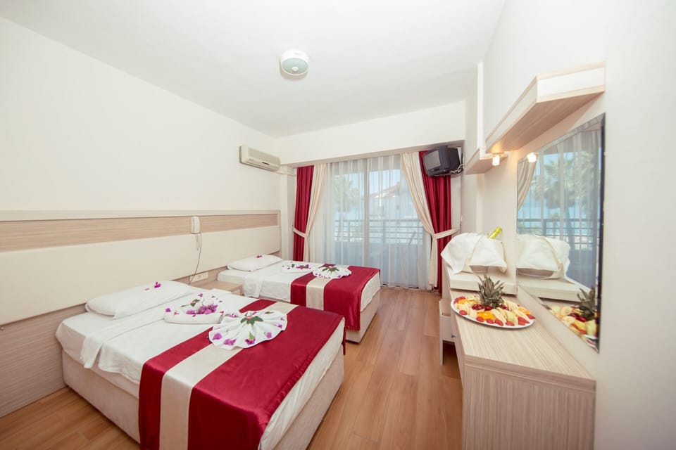 Minibar, iron/ironing board (on request), bed sheets