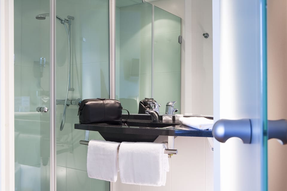 Shower, free toiletries, hair dryer, towels