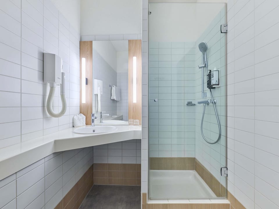 Desk, blackout drapes, iron/ironing board, free cribs/infant beds