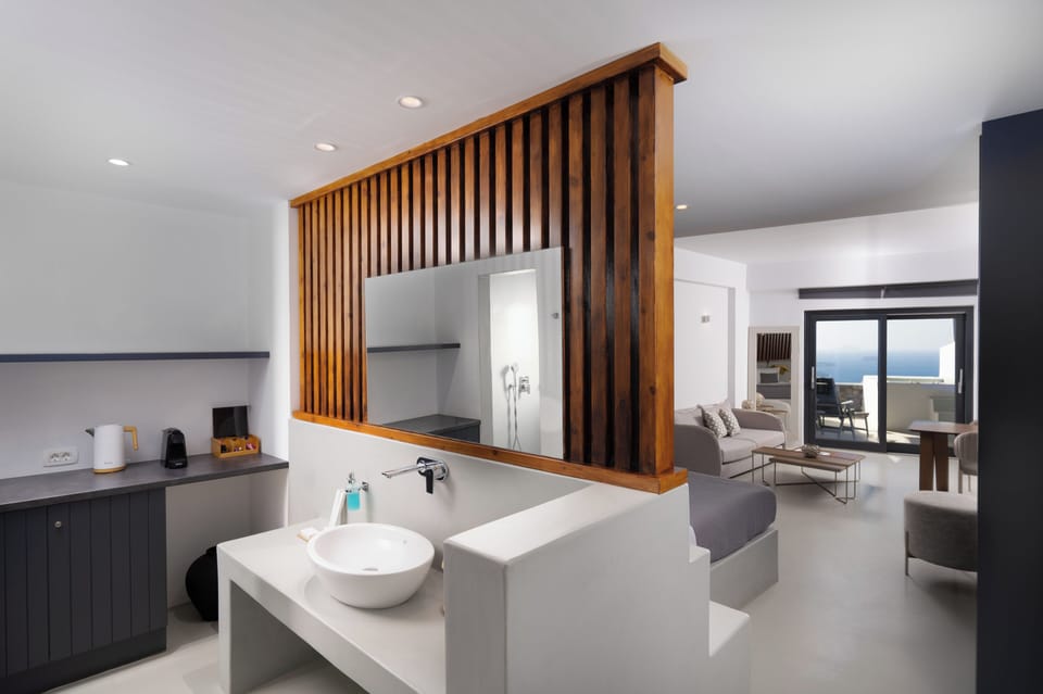 Serenity Suite Caldera View with Hot tub | Bathroom | Shower, rainfall showerhead, eco-friendly toiletries, hair dryer