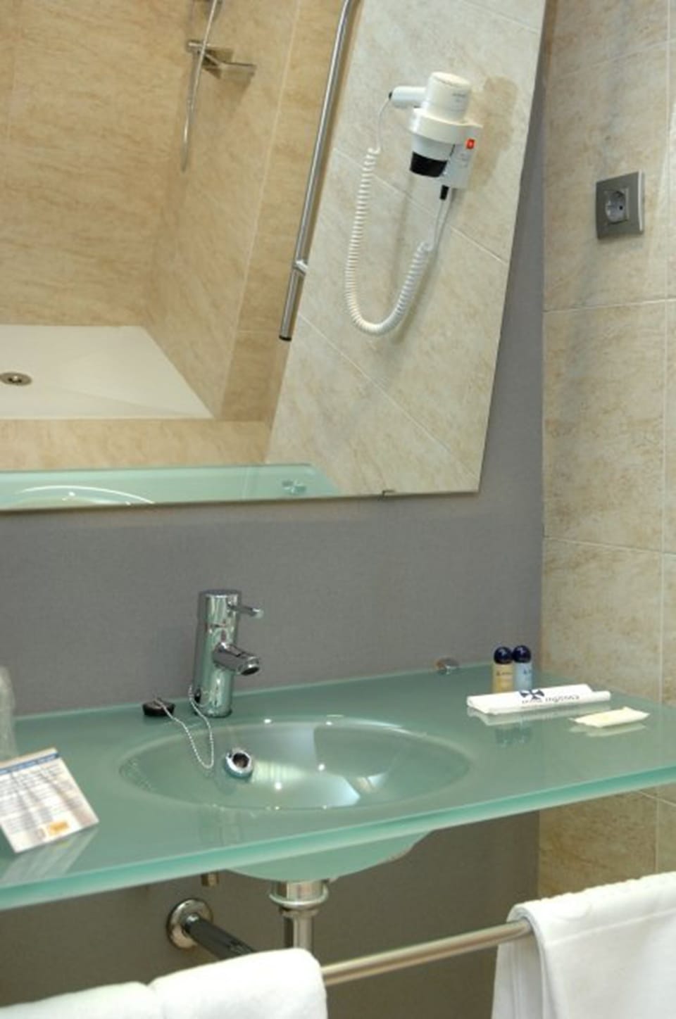 Shower, free toiletries, hair dryer, towels