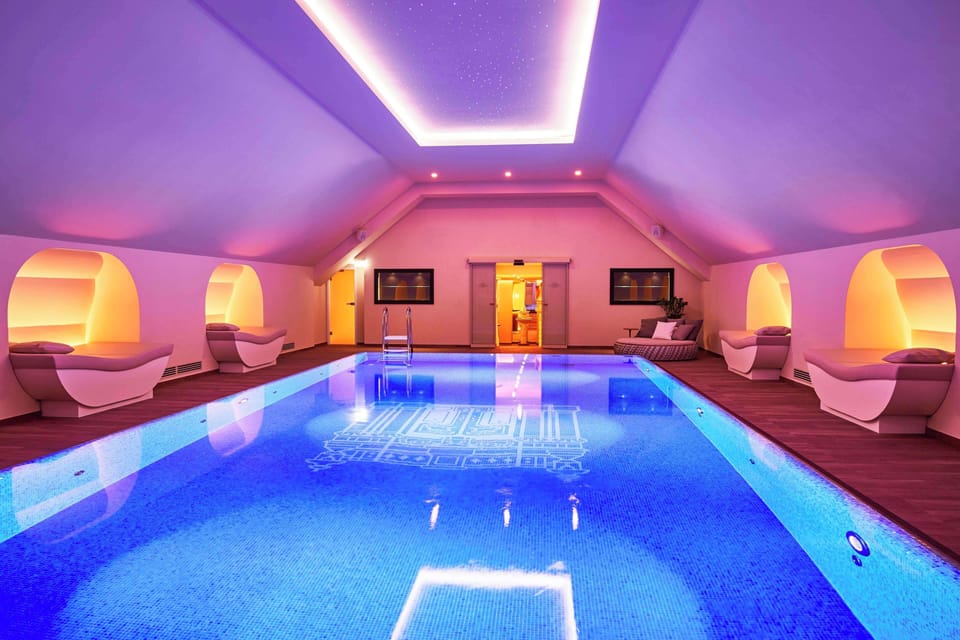 Indoor pool, open 7:00 AM to 8:00 PM, sun loungers