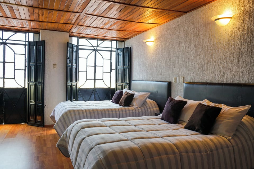 Room, 2 Double Beds | In-room safe, desk, iron/ironing board, free WiFi