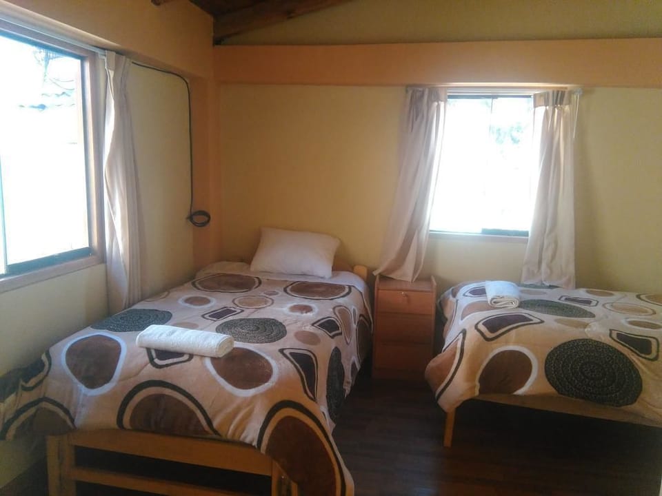 Twin Room, 2 Twin Beds | In-room safe, iron/ironing board (on request), WiFi (free)