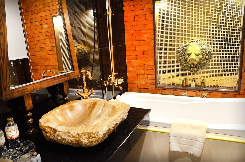 Executive Suite | Bathroom | Designer toiletries, hair dryer, towels, soap